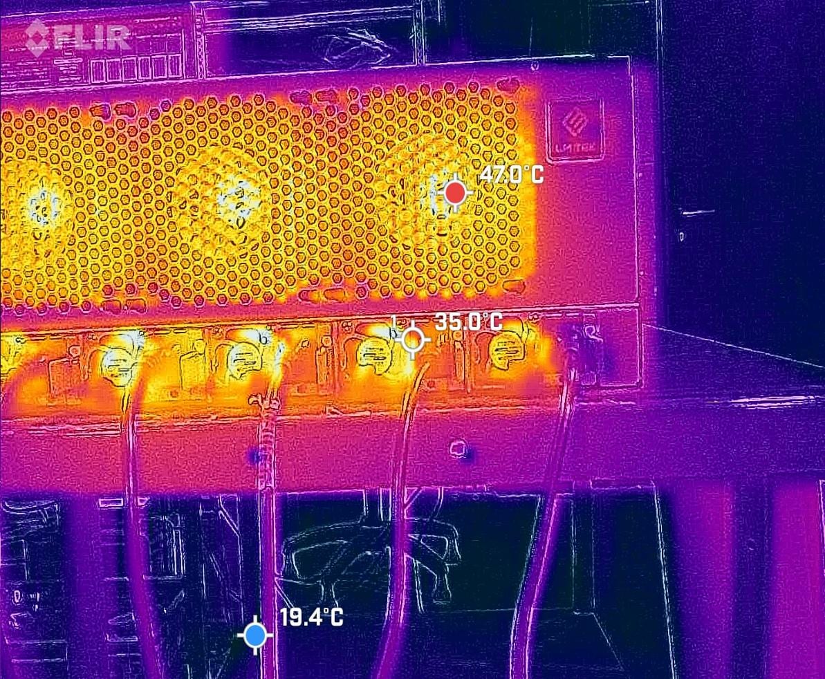 Thermal image of a server rear under load: the heat leaves the chassis into the room