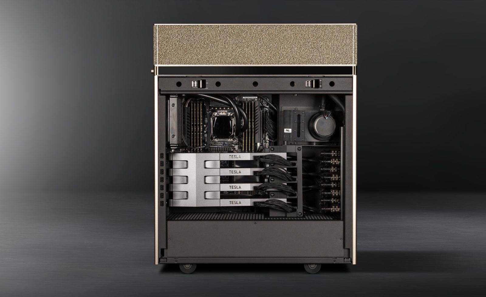 DGX Station A100 opened from the side, its four GPUs and CPU connected to the cooling loop