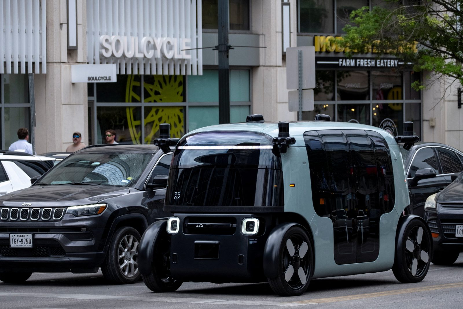 Zoox robotaxi driving in city traffic